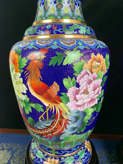 Detailed close-up of the Cloisonné vase body featuring a vibrant phoenix and pink peony, showcasing intricate gold wire filigree and hand-painted mineral enamel.